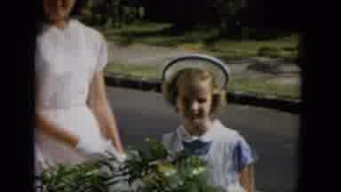 Hawaii (1965): Young Girls Dressed Up In A Dress