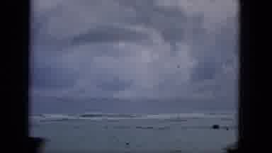Hawaii (1965): Driving Across A Bridge With Cars,People And Stormy Weather.