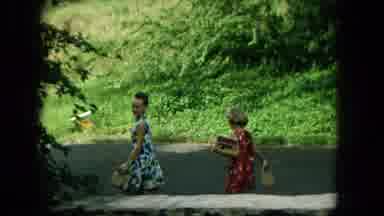 Hawaii (1965): Two People Walking Away On A Road