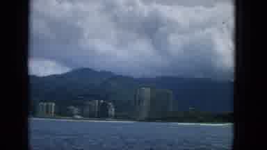Hawaii (1965): Rolling Clouds Over Seaside Village.