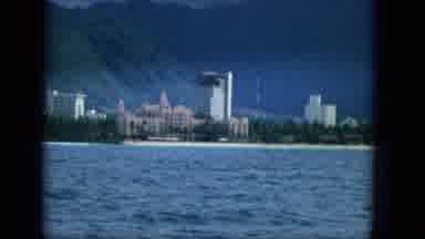 1965:EASTER MOLOKAI WHALES BEACH PARADE ALOHA TOWER. View Of The Shoreline From