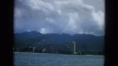 1965:EASTER MOLOKAI WHALES BEACH PARADE ALOHA TOWER. The City Built On Mountains