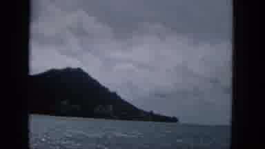 1965:EASTER MOLOKAI WHALES BEACH PARADE ALOHA TOWER. Clouds Hanging Over A Hill