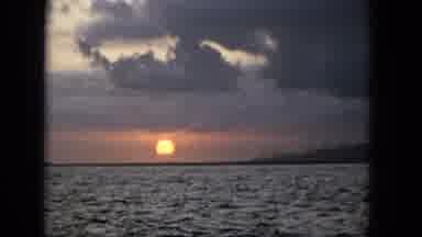 1965:EASTER MOLOKAI WHALES BEACH PARADE ALOHA TOWER. Stormy Sunset