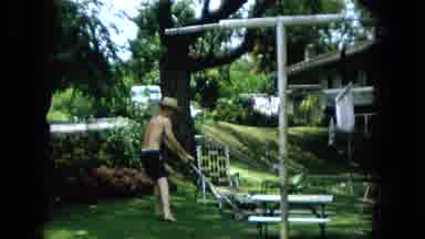 1965:EASTER MOLOKAI WHALES BEACH PARADE ALOHA TOWER. Man Mowing The Grasses