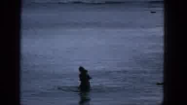 1965:EASTER MOLOKAI WHALES BEACH PARADE ALOHA TOWER. Girls Playing In The Water.