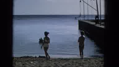 1965:EASTER MOLOKAI WHALES BEACH PARADE ALOHA TOWER. Walking With Friends At The
