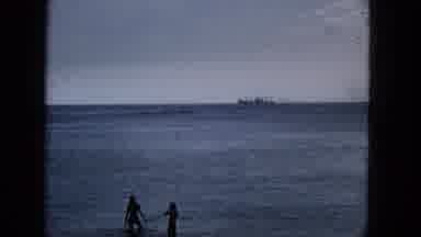 1965:EASTER MOLOKAI WHALES BEACH PARADE ALOHA TOWER. Couple Shadow Silhouettes