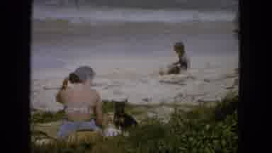 1965:EASTER MOLOKAI WHALES BEACH PARADE ALOHA TOWER. People Sitting On Beach,
