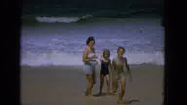 1965:EASTER MOLOKAI WHALES BEACH PARADE ALOHA TOWER. A Woman And Two Girls