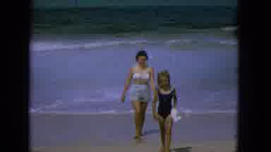 1965:EASTER MOLOKAI WHALES BEACH PARADE ALOHA TOWER. A Day At The Beach