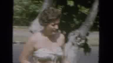 1965:EASTER MOLOKAI WHALES BEACH PARADE ALOHA TOWER. Woman With A Tennis Racket