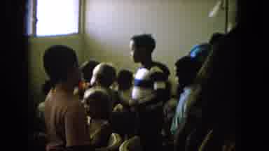 1965:EASTER MOLOKAI WHALES BEACH PARADE ALOHA TOWER. Kids Gathered Around The Tv