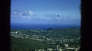 1965:EASTER MOLOKAI WHALES BEACH PARADE ALOHA TOWER. Flying Over A Volcano