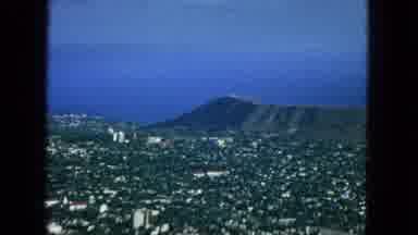 1965:EASTER MOLOKAI WHALES BEACH PARADE ALOHA TOWER. Picture Of A City On An