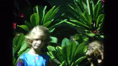 1965:EASTER MOLOKAI WHALES BEACH PARADE ALOHA TOWER. Girls In Leafy Garden
