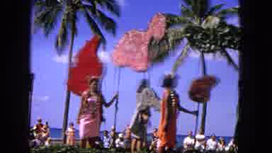 1965:EASTER MOLOKAI WHALES BEACH PARADE ALOHA TOWER. Hawaiian Parade Draws Large