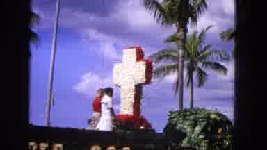 1965:EASTER MOLOKAI WHALES BEACH PARADE ALOHA TOWER. Float Clouds Man Waving