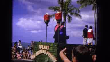 1965:EASTER MOLOKAI WHALES BEACH PARADE ALOHA TOWER. Float Clouds Man Waving