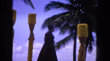 1965:EASTER MOLOKAI WHALES BEACH PARADE ALOHA TOWER. Lady On Float Glides By