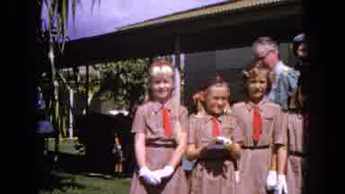 1965:EASTER MOLOKAI WHALES BEACH PARADE ALOHA TOWER. Brownies Pose Outdoors With