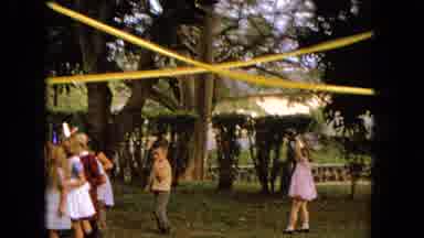 1965:EASTER MOLOKAI WHALES BEACH PARADE ALOHA TOWER. Children Playing Outside At
