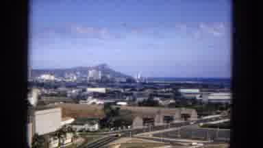 1965:EASTER MOLOKAI WHALES BEACH PARADE ALOHA TOWER. Overview Of Large City