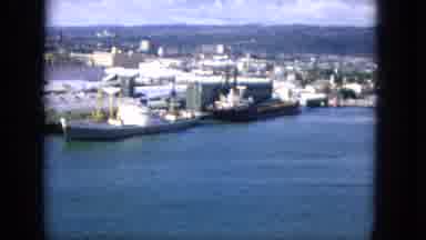 1965:EASTER MOLOKAI WHALES BEACH PARADE ALOHA TOWER. Freight Ships On Water With