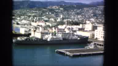 1965:EASTER MOLOKAI WHALES BEACH PARADE ALOHA TOWER. The Shoreline Of A City By