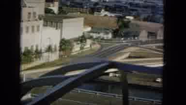 1965:EASTER MOLOKAI WHALES BEACH PARADE ALOHA TOWER. Bridge With Two People Male