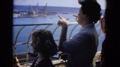 1965:EASTER MOLOKAI WHALES BEACH PARADE ALOHA TOWER. A Video Of A Mother And