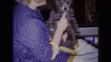Wellsburg Iowa (1965): Small Dog On Woman's Lap
