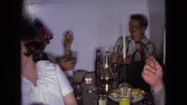 Wellsburg Iowa (1965): People Talk And Fraternize At A Table And One Of The People