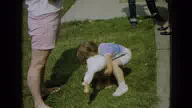Wellsburg Iowa (1965): Little Child Carrying Duck At The Yard