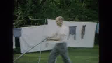 Wellsburg Iowa (1965): One Handed Mowing Around The Laundry Drying Outside