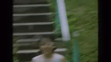Wellsburg Iowa (1965): A Family Has Fun By Using A Hose