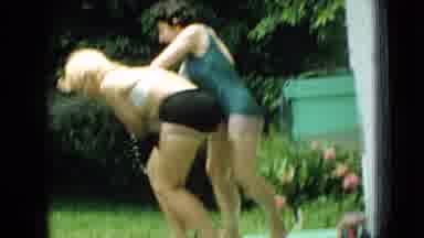 Wellsburg Iowa (1965): Play Fighting Over Squirting Each Other With The Garden