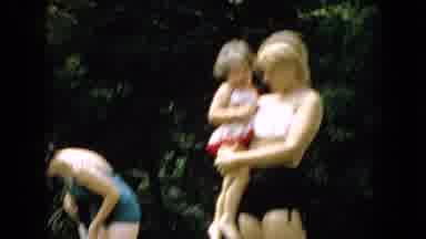 Wellsburg Iowa (1965): Keeping Duck Cool With A Garden Hose