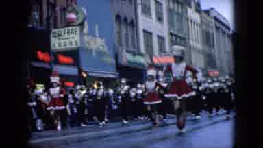 Wellsburg Iowa (1965): Parade Of Energetic Marching Band Down A Neon Lit American