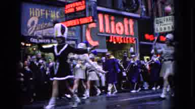 Wellsburg Iowa (1965): A Women's Marching Band Parading Through The Streets