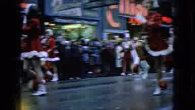 Wellsburg Iowa (1965): Marching Band In A Parade Going Down A Street