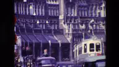 Amsterdam Netherlands (1967): Boys Riding Their Bikes Down A Busy Street.