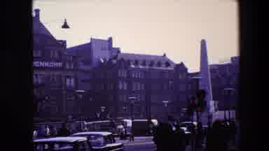 Amsterdam Netherlands (1967): An Obelisk In The Center Of Several Buildings And A