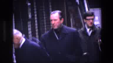 Amsterdam Netherlands (1967): Well Dressed People Walking Through Busy City Street