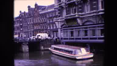 Amsterdam Netherlands (1967): Old Buildings On A City Street With Pedestrian And A