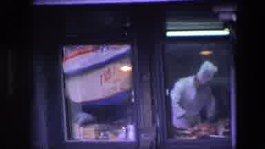 Amsterdam Netherlands (1967): A Male Chef Dressed In Whites Stands In A Window And