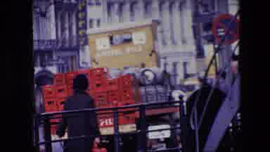 Amsterdam Netherlands (1967): City By The Water With People And Truck Passing By.