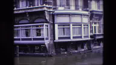 Amsterdam Netherlands (1967): Tall Buildings With Many Windows And Balconies On