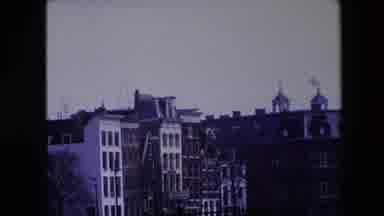 Amsterdam Netherlands (1967): City Buildings With Towers In Background