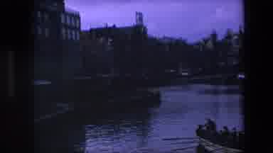 Amsterdam Netherlands (1967): A Row Of Townhouses Sitting By The River.